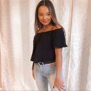 Black off the shoulder shirt